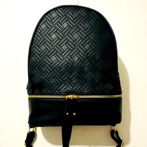 Black primark backpack with gold chain handle and black adjustable straps